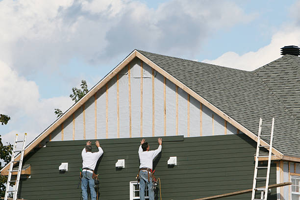 Professional Siding Contractor technician working in Cypress, TX